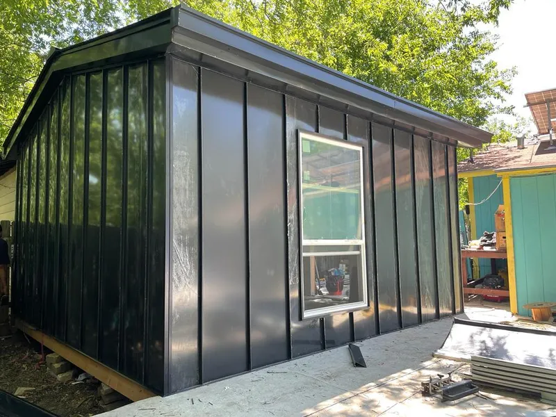 Black standing seam metal wall panels for Roof Inspection in South Fayette