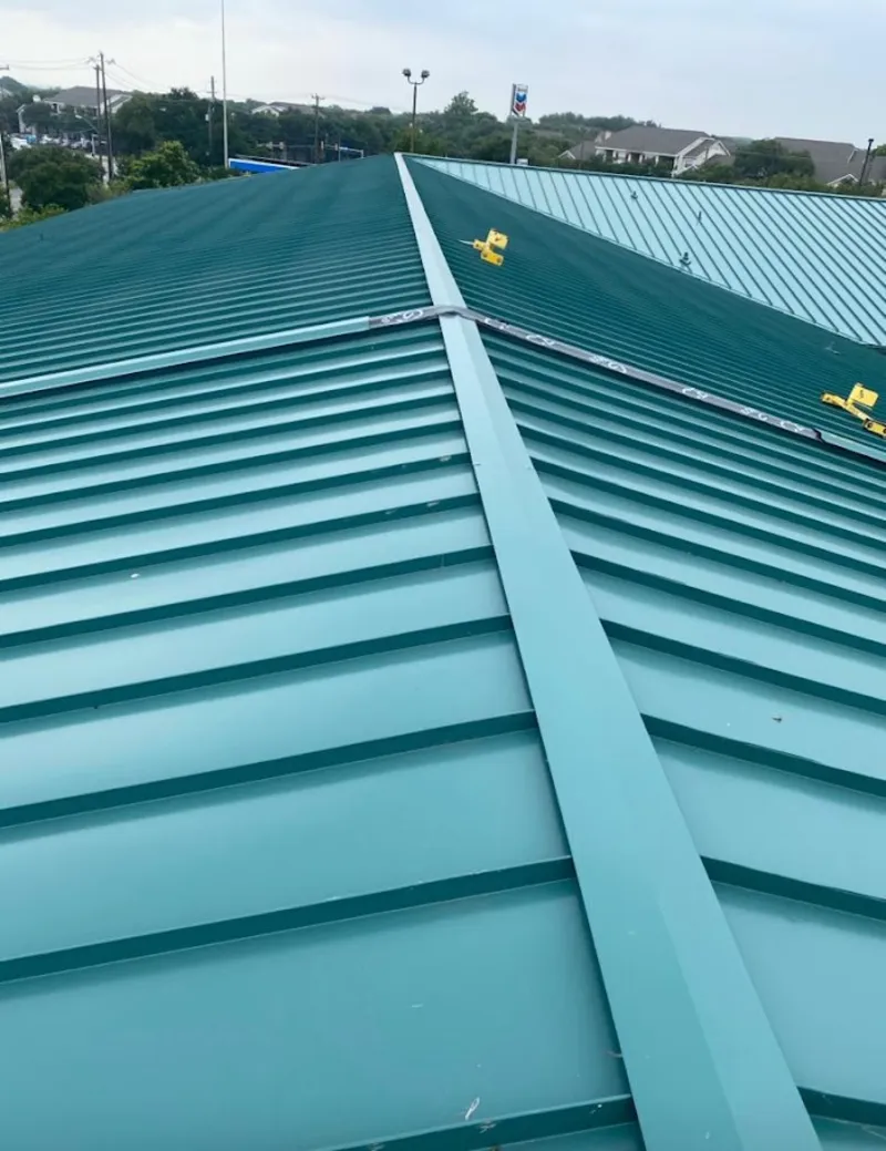 Green commercial metal roof ridge and valley for Metal Roof Repair in South Fayette